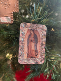 Hand punched tin ornament: Our Lady of Guadalupe.